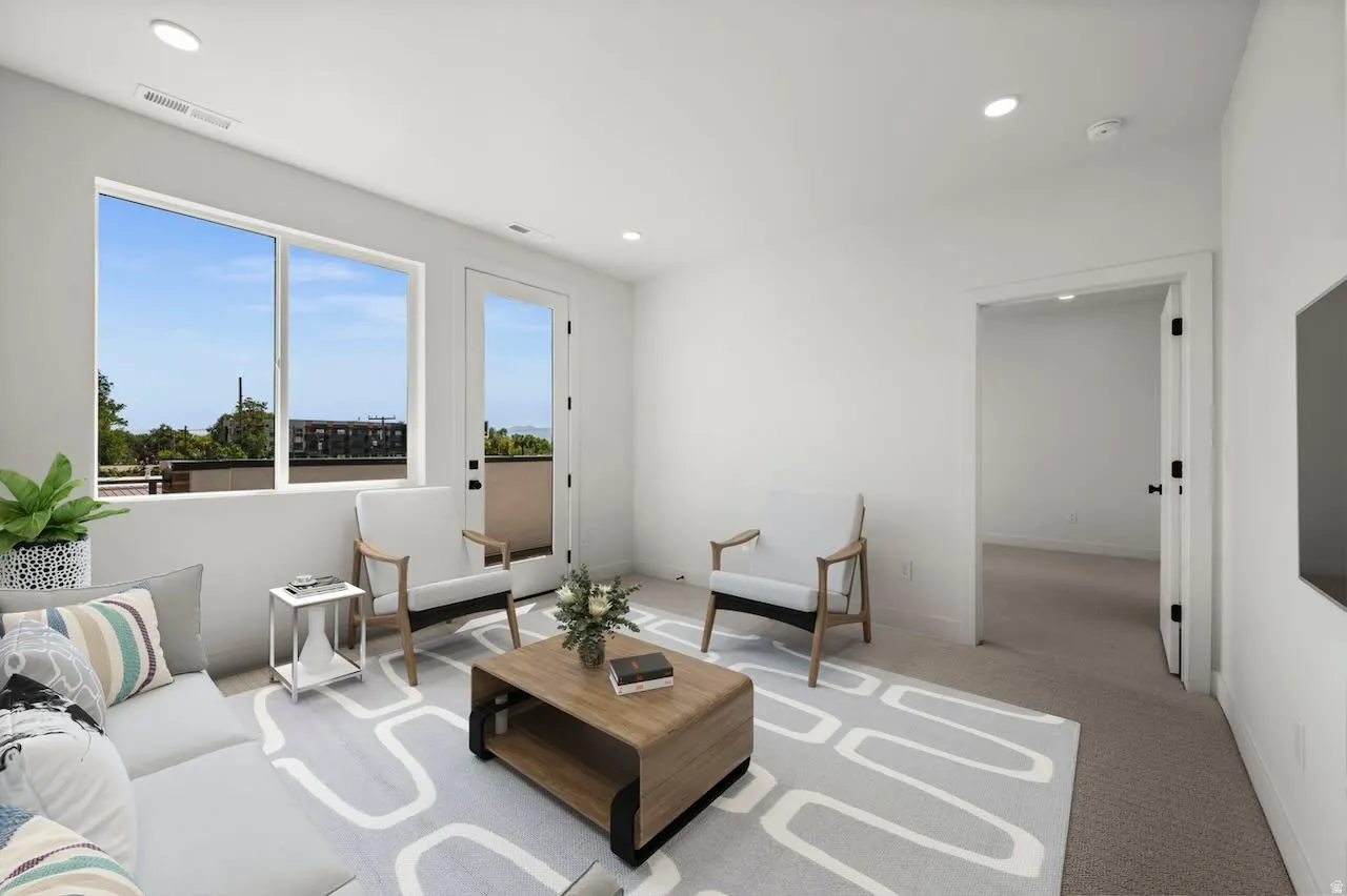 Additional living area on the 3rd floor. Note: this photo has been modified to include virtual staging