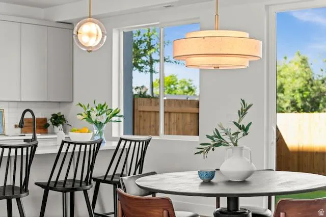 Kitchen island with light-toned cabinetry and a white countertop