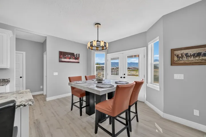 Breakfast nook with french doors to the backyard