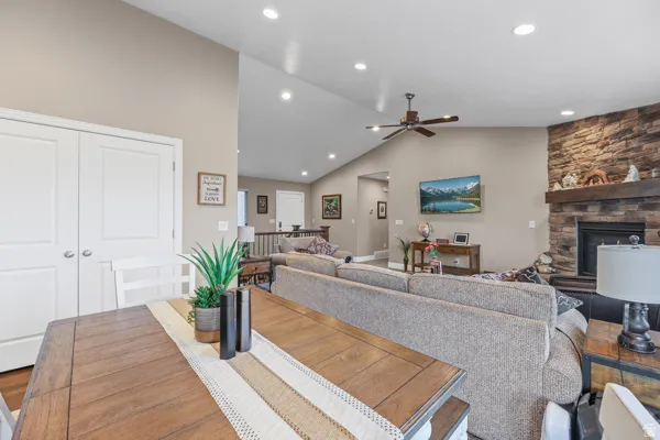 Vaulted ceilings with recessed lighting.