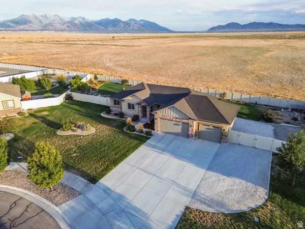 Lime fine driveway extends along the side of the house w/plenty of room for RV parking.