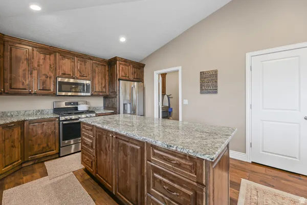 Access to laundry and garage through the kitchen.