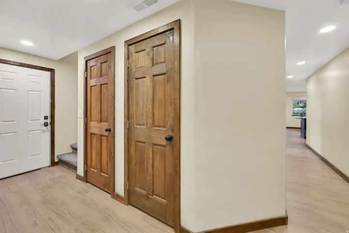 Wood-finish flooring with light-toned walls