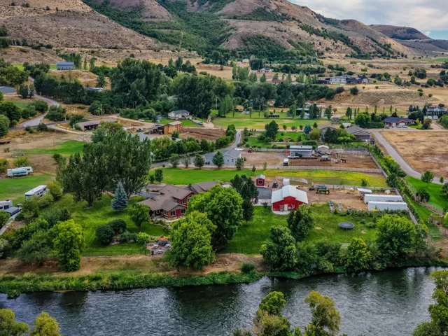 Riverfront setting with surrounding mountainous terrain