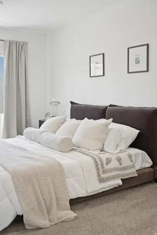 Wall-to-wall carpeting and neutral wall tones