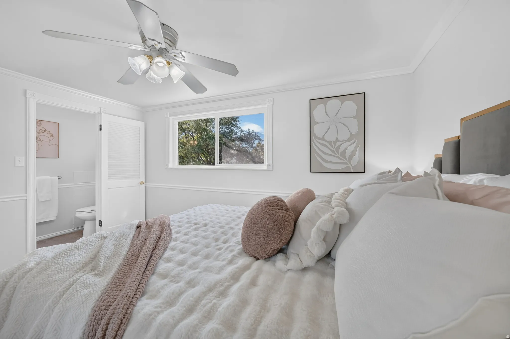Primary bedroom with attached half bath