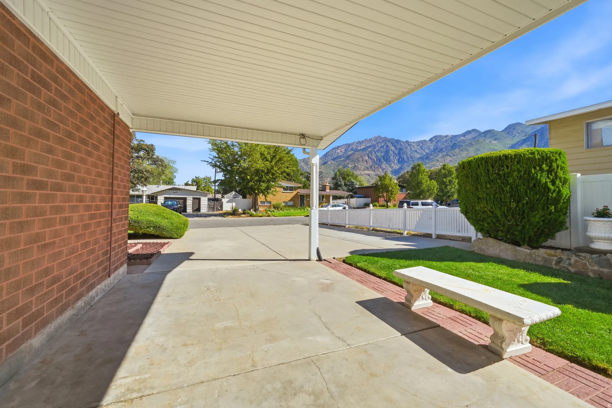 Carport and large driveway for parking multiple vehicles or an RV