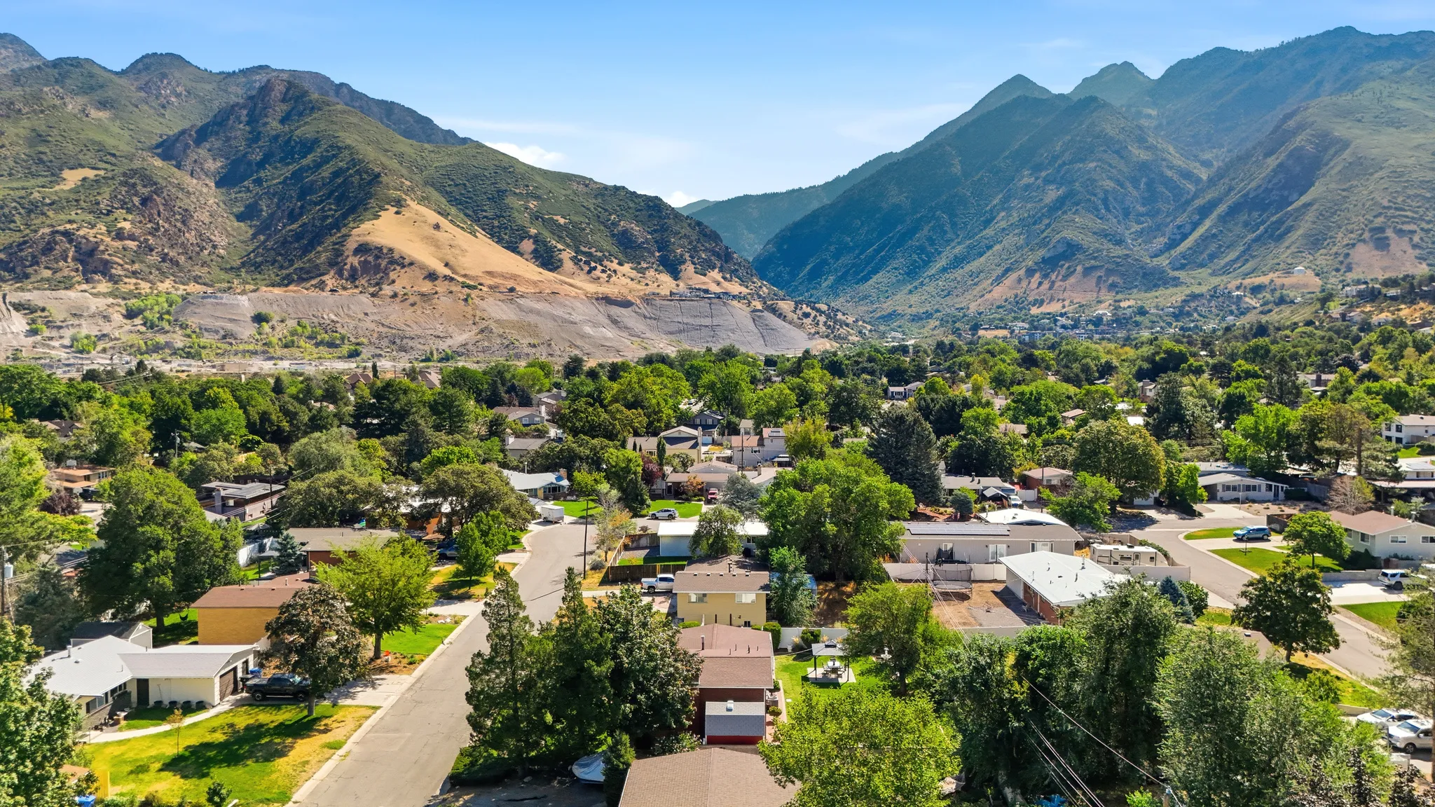 Mountainous backdrop with a residential neighborhood