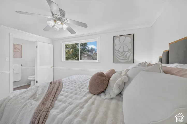 Primary bedroom with attached half bath