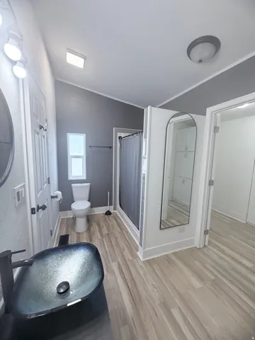 Wood-finish flooring throughout