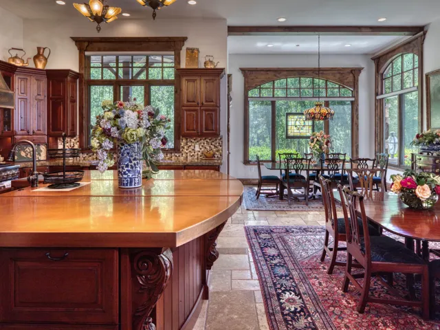 Expansive kitchen island with a copper countertop