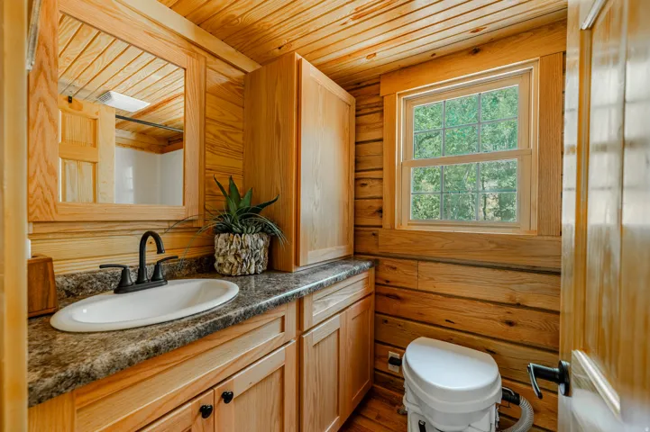Wood-paneled walls and ceiling
