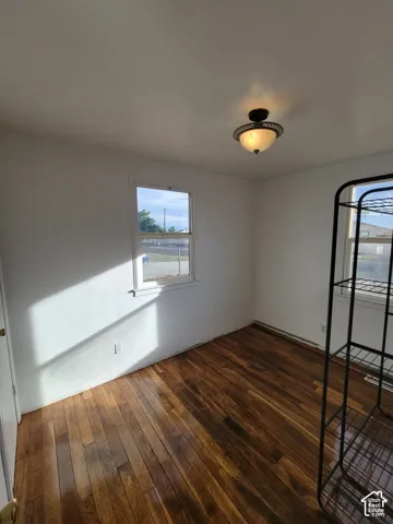 Wood-finish flooring with white walls