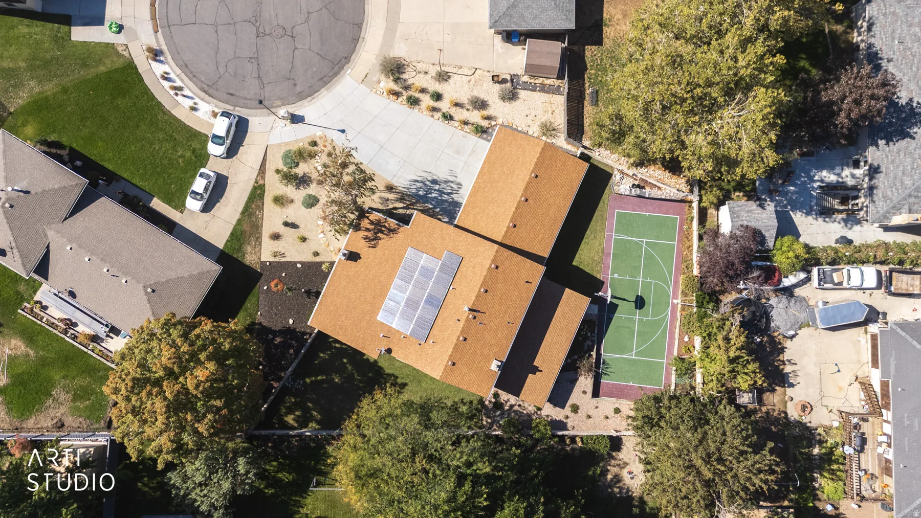 Asphalt shingle roof with solar panel array