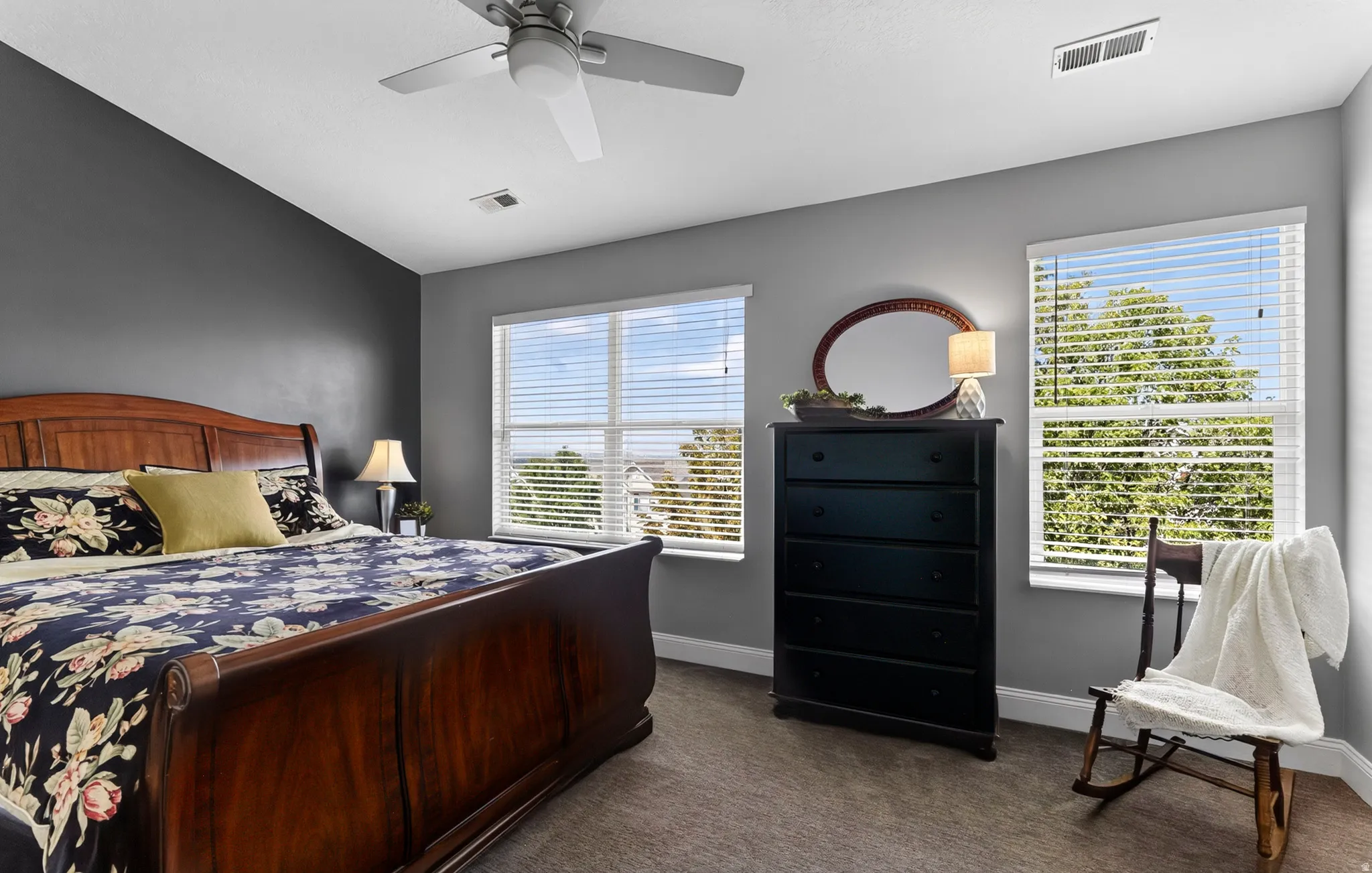 Recessed lighting, ceiling fan, and dual windows