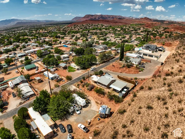 Expansive neighborhood setting with established properties and varied topography