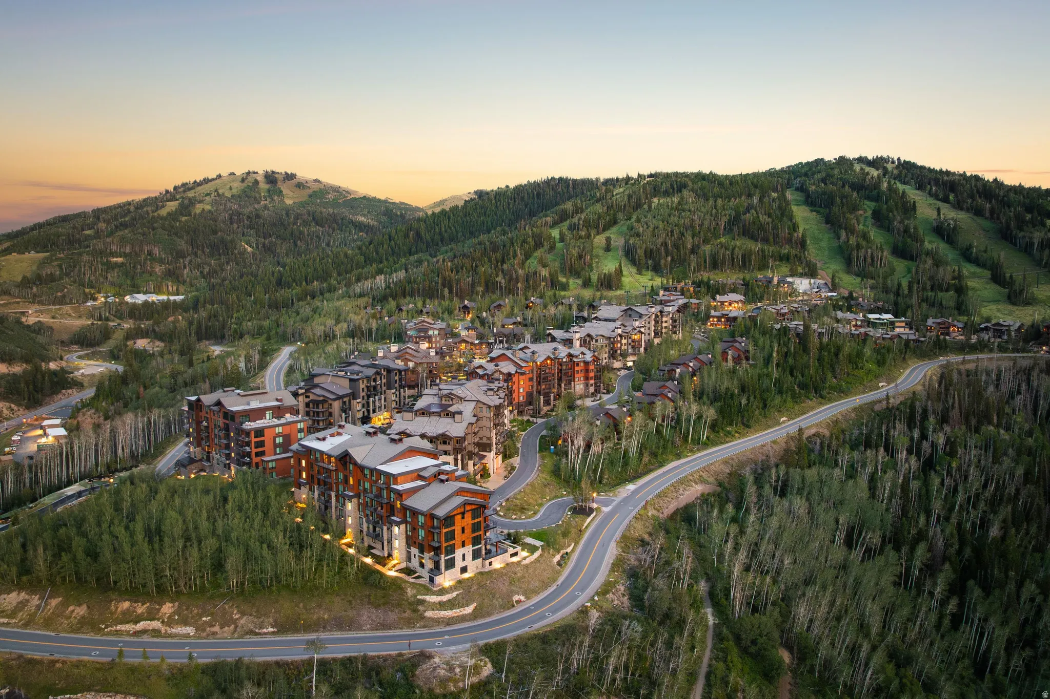 Mountainous terrain with evergreen and deciduous trees