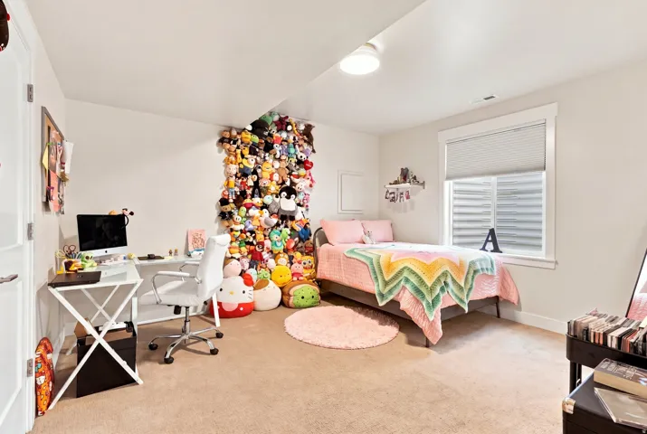 Wall-to-wall carpeting and neutral wall tones