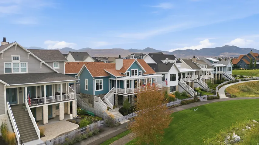 Multiple properties featuring various architectural styles, elevated covered porches, and a paved pathway