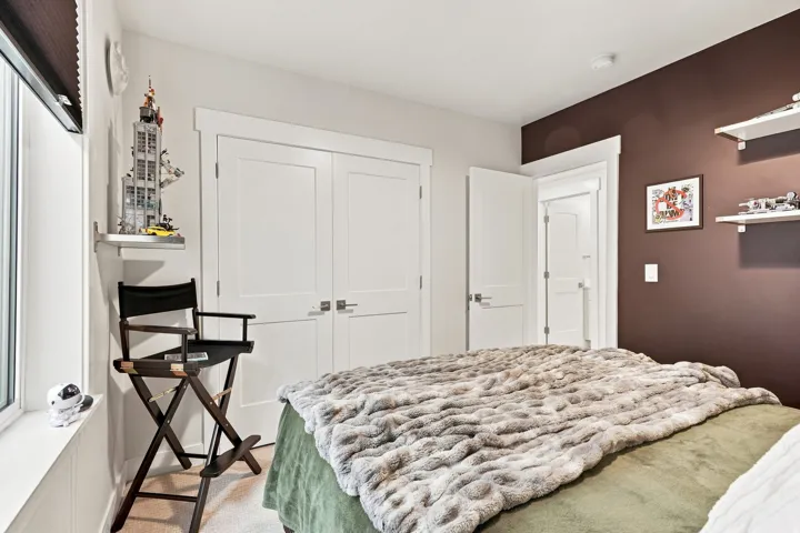 White trim, dual panel doors, and neutral wall tones