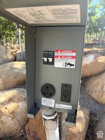 Front of driveway has 30 amp and 10 amp power, water, and RV dump for convenience. Ideal for family or guests with RV.