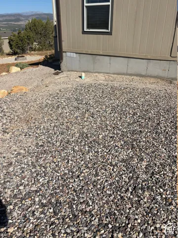 side yard of home has RV clean out for convenience.