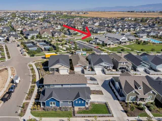 Red Arrow pointing to the Club House with the pickleball courts and swimming pool right there as well. Just located around the corner.