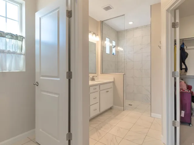 Primary Bathroom - walk in closet and separate Toilet area.