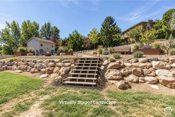Tiered landscape featuring natural stone retaining walls, open-tread staircase, graveled ground cover, metal garden beds, and detached storage structure - Virtural landscape- Not Existing