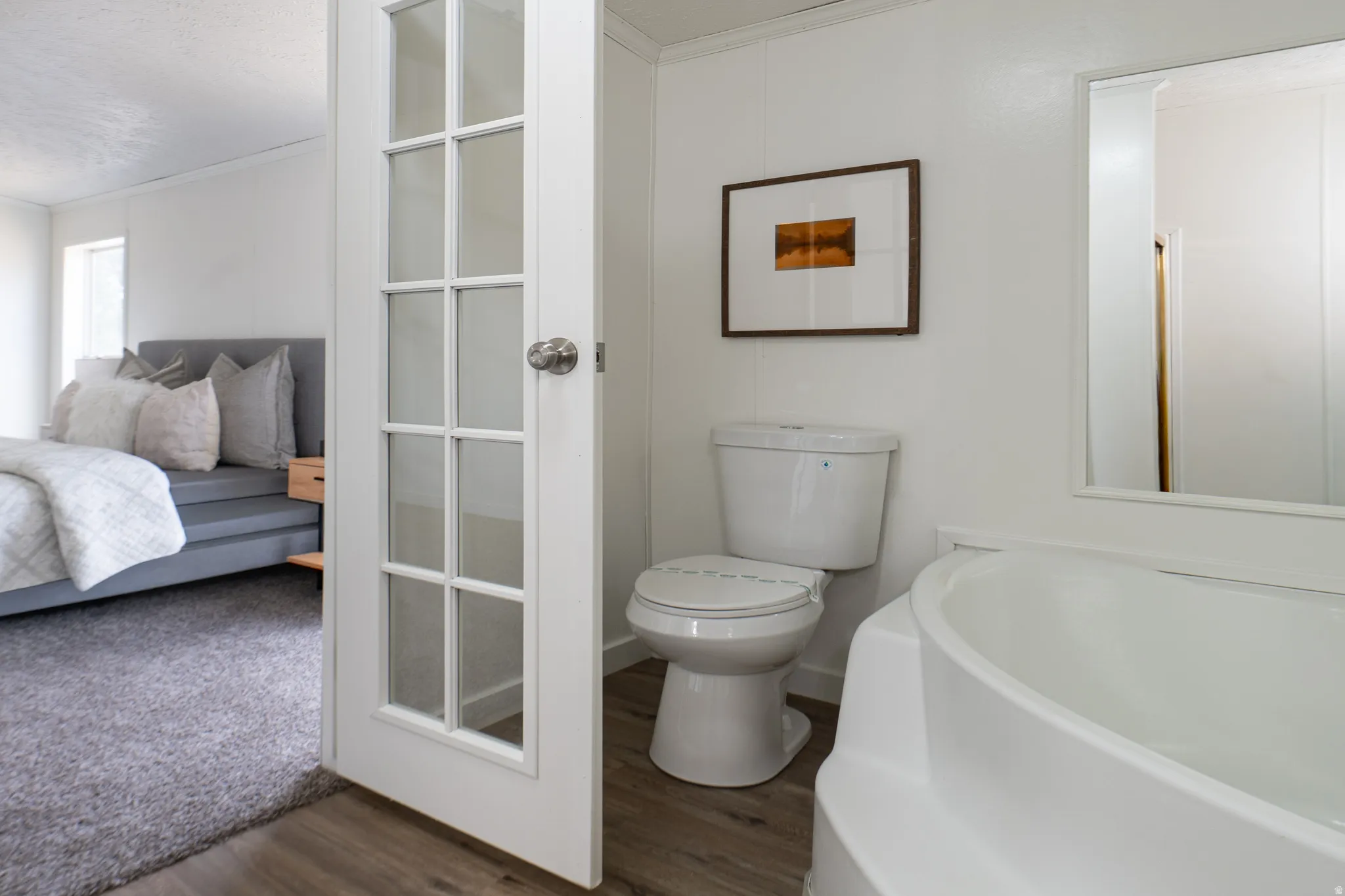 White paneled door with glass inserts