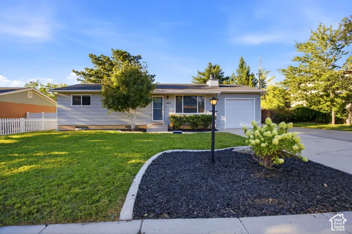 Light gray exterior siding with an attached garage