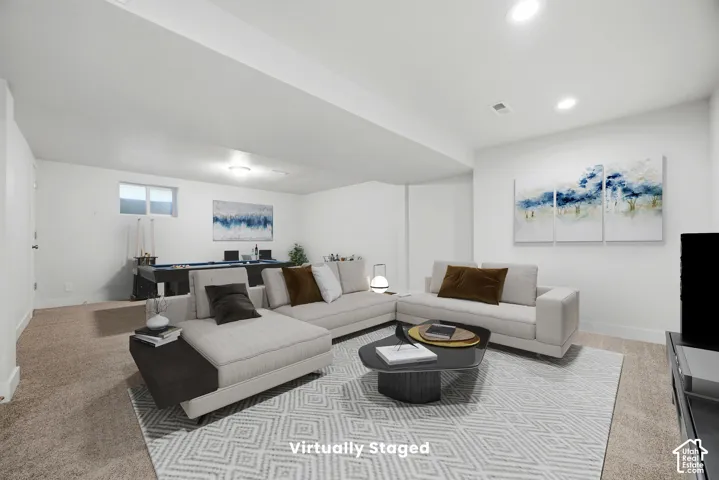 Recessed ceiling lighting, flush-mount ceiling lighting, window with privacy glass, carpet flooring, and white walls