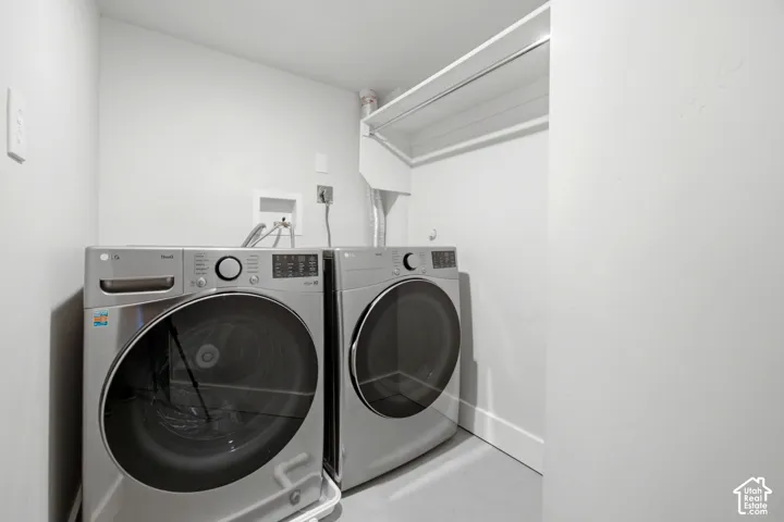 Laundry area with a built-in shelf and hanging rod