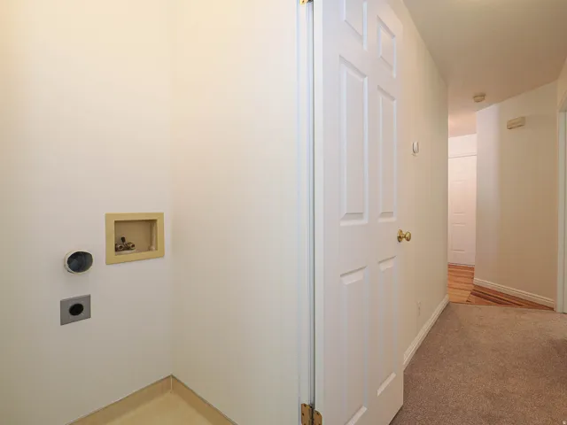 Appliance hookups, panel doors, and carpeted flooring