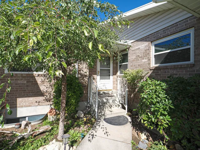 Brick exterior with white siding accents