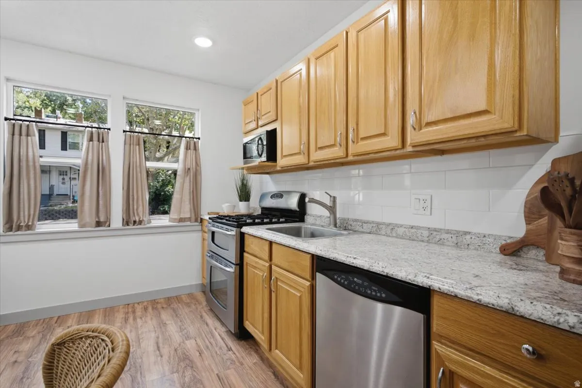 Laminate wood-finish flooring with multiple windows