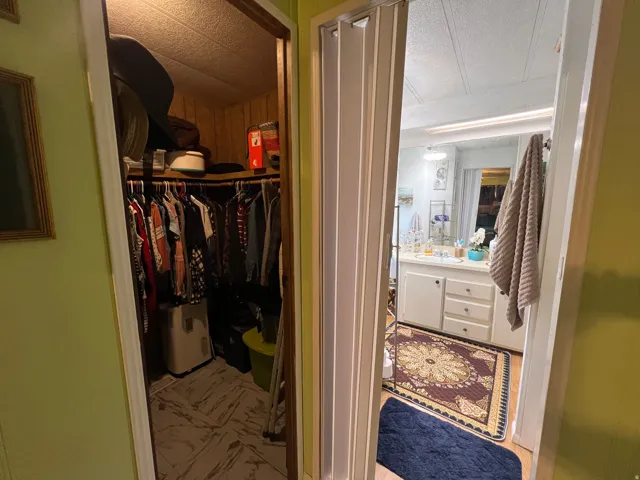 Primary bathroom and walk-in closet