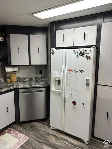 White cabinetry with dark contrasting frames