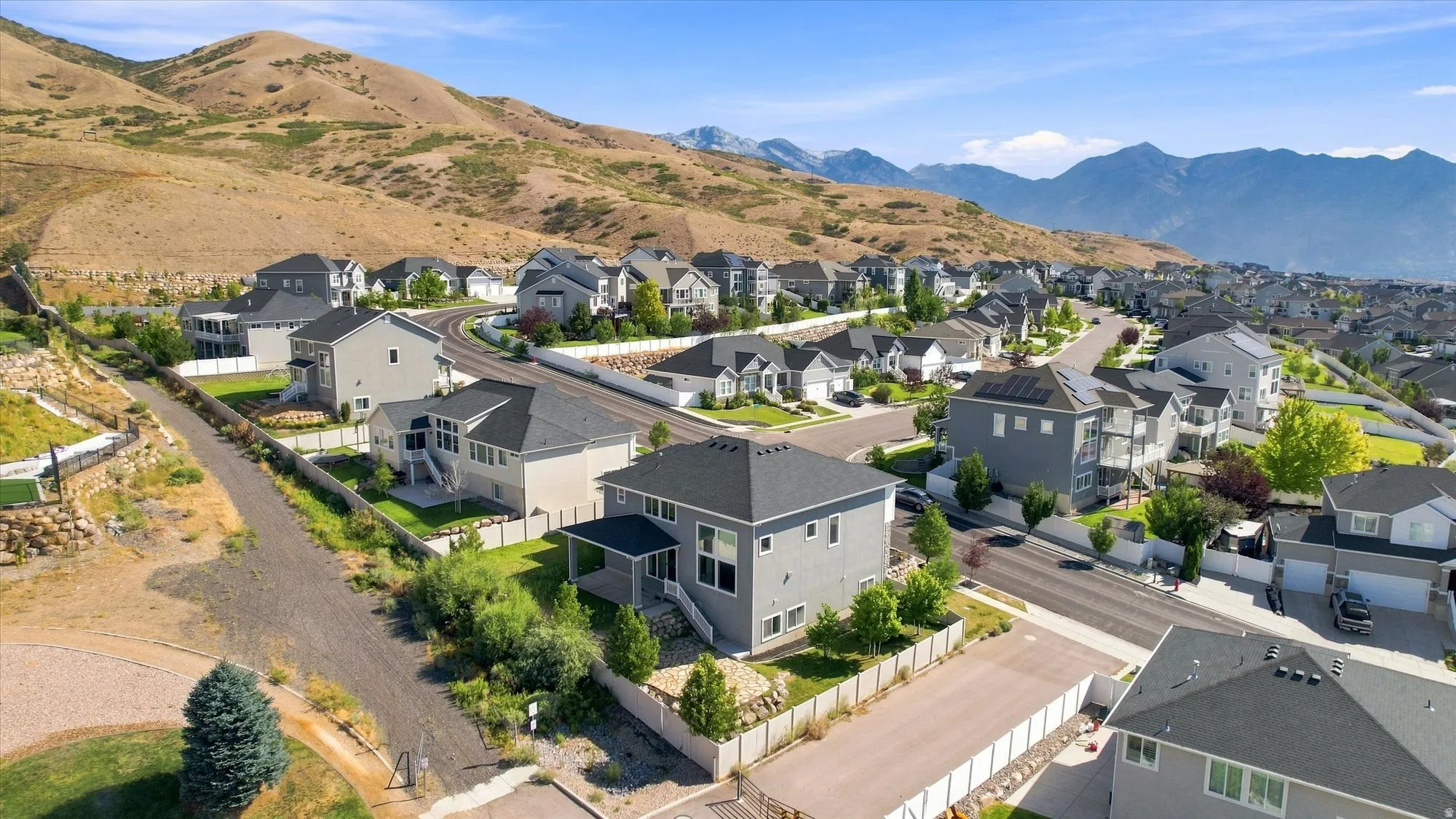 Residential neighborhood with a mountain backdrop
