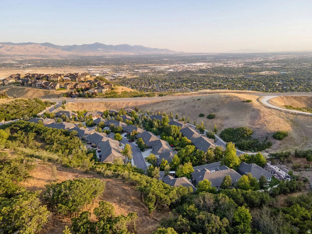 Community setting with abundant mature trees and distant mountain ranges