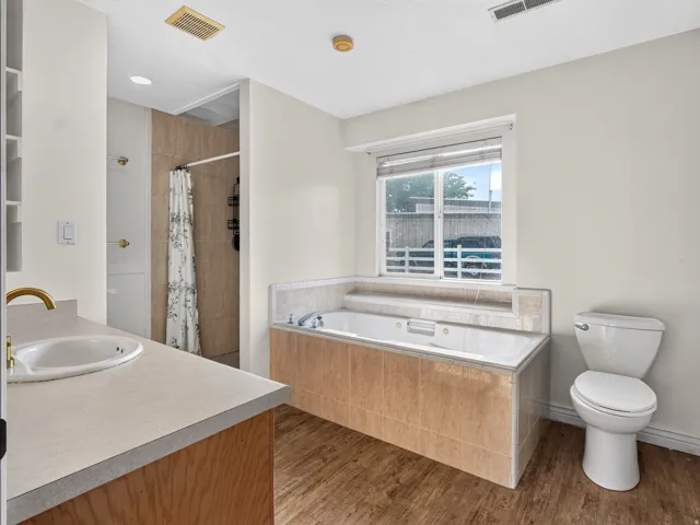 Wood-finish flooring throughout
