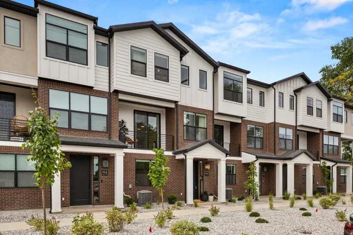 Contemporary exterior architecture with brick and vertical siding accents
