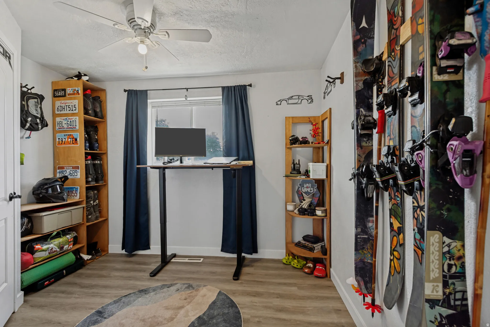 Hard surface flooring and a ceiling fan with integrated lighting