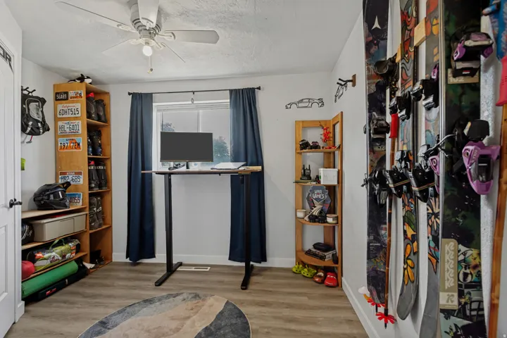 Hard surface flooring and a ceiling fan with integrated lighting