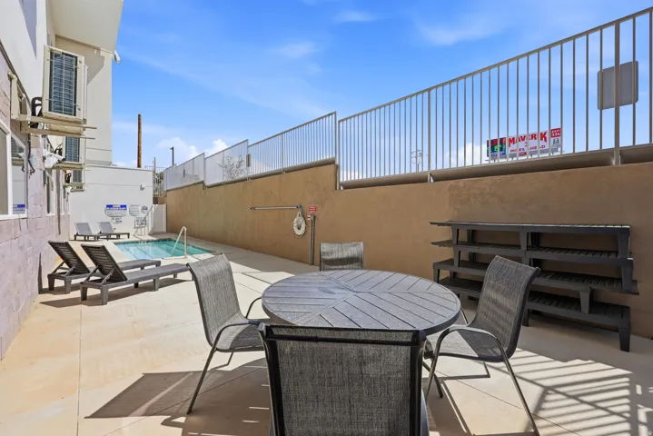 Outdoor swimming pool and paved patio area
