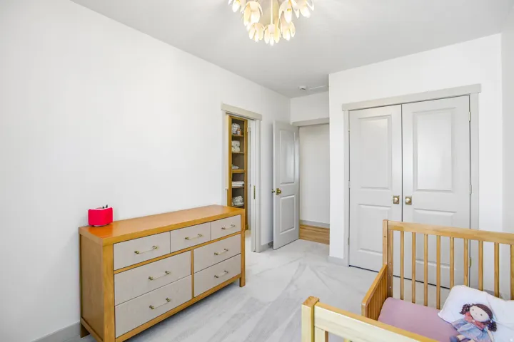 White walls with light-toned flooring