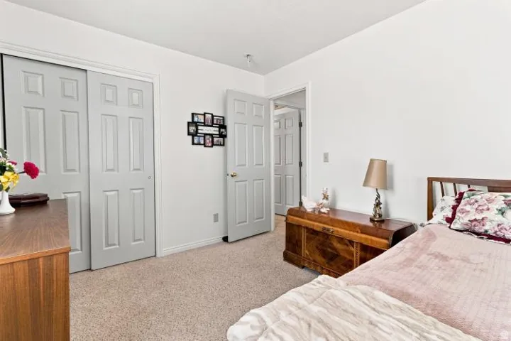 Plush carpet flooring complements crisp white walls