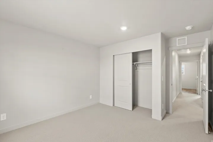 **DISCLAIMER**   Interior package upgrades not photographed. Light neutral wall tones