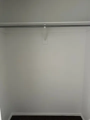 Built-in shelving with hanging rod