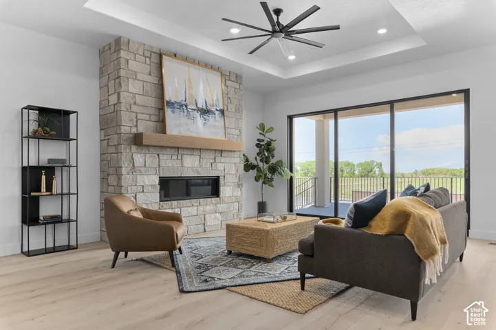 Stone-faced fireplace with a wood mantel